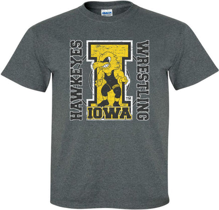 The perfect shirt to Cheer on our Iowa Hawkeye Wrestlers at Carver-Hawkeye Arena! This design features the Wrestling Herky on a big "I" and a wrestling circle. The design also says Iowa Hawkeyes Wrestling. Printed on a pre-shrunk, 50/50 cotton/poly dark gray t-shirt with white, gold and black ink. All of our Iowa Hawkeye designs are Officially Licensed and approved by the University of Iowa.