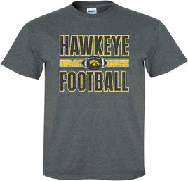 This Hawkeye Football design features a football with the Tigerhawk and the stripes that are on the Iowa Football uniforms. Printed on a pre-shrunk, 50/50 cotton/poly dark gray t-shirt with white, black and gold ink. All of our Iowa Hawkeye designs are Officially Licensed and approved by the University of Iowa.