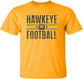 This Hawkeye Football design features a football with the Tigerhawk and the stripes that are on the Iowa Football uniforms. Printed on a pre-shrunk, 100% cotton gold t-shirt with white, black and gold ink. All of our Iowa Hawkeye designs are Officially Licensed and approved by the University of Iowa.