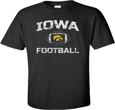 Show your support for the Iowa Football team with this design that has Iowa Football and a football with a gold Tigerhawk. Printed on a pre-shrunk, 100% cotton black t-shirt with white, black and gold ink. All of our Iowa Hawkeye designs are Officially Licensed and approved by the University of Iowa.