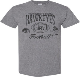 This old school Iowa football design has The University of Iowa Hawkeyes above a football. Inside the football has Since 1847. This design also has the Tigerhawk and the Old School Football Herky.  Printed on a medium gray t-shirt with black ink. 