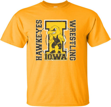 The perfect shirt to Cheer on our Iowa Hawkeye Wrestlers at Carver-Hawkeye Arena! This design features the Wrestling Herky on a big "I" and a wrestling circle. The design also says Iowa Hawkeyes Wrestling. Printed on a pre-shrunk, 100% cotton youth gold t-shirt with white, gold and black ink. All of our Iowa Hawkeye designs are Officially Licensed and approved by the University of Iowa.