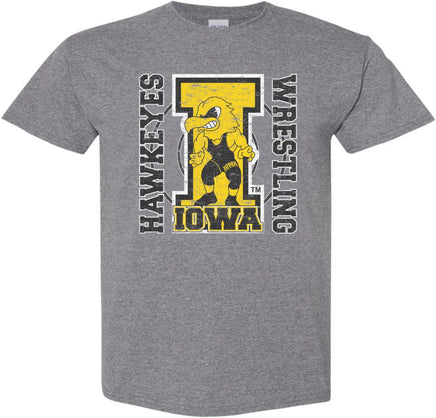 The perfect shirt to Cheer on our Iowa Hawkeye Wrestlers at Carver-Hawkeye Arena! This design features the Wrestling Herky on a big "I" and a wrestling circle. The design also says Iowa Hawkeyes Wrestling. Printed on a pre-shrunk, 50/50 cotton/poly medium gray t-shirt with white, gold and black ink. All of our Iowa Hawkeye designs are Officially Licensed and approved by the University of Iowa.