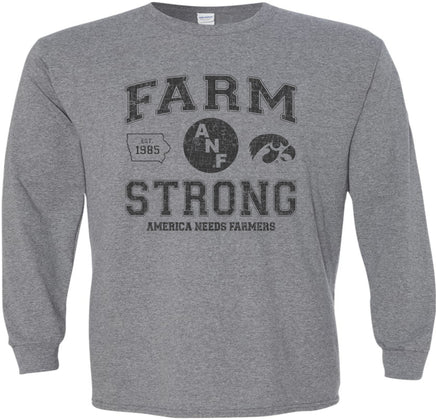 A medium gray long-sleeve t-shirt with a distressed black design on the front that reads 'FARM STRONG' with 'AMERICA NEEDS FARMERS' underneath, alongside the ANF logo and the Iowa Hawkeyes Tigerhawk logo.