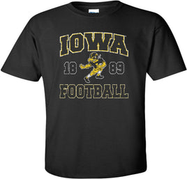 This Iowa football design features the Old School Football Herky running for a touchdown! The perfect shirt to wear to Kinnick Stadium! Printed on a pre-shrunk, 100% cotton black youth t-shirt with white, gold and black ink. All of our Iowa Hawkeye designs are Officially Licensed and approved by the University of Iowa.