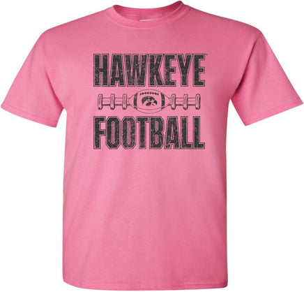 Cheer on the Iowa Hawkeyes at Kinnick Stadium wearing this Hawkeye Football shirt. This design has Hawkeye Football, a football with the Tigerhawk, and football laces. Printed on a pre-shrunk, 100% cotton azalea pink t-shirt with black ink. All of our Iowa Hawkeye designs are Officially Licensed and approved by the University of Iowa.