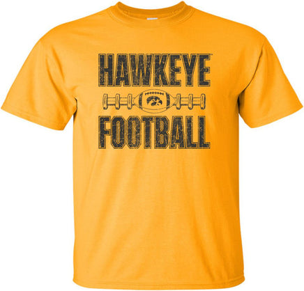 Cheer on the Iowa Hawkeyes at Kinnick Stadium wearing this Hawkeye Football shirt. This design has Hawkeye Football, a football with the Tigerhawk, and football laces. Printed on a pre-shrunk, 100% cotton gold t-shirt with black ink. All of our Iowa Hawkeye designs are Officially Licensed and approved by the University of Iowa.