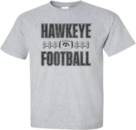 Cheer on the Iowa Hawkeyes at Kinnick Stadium wearing this Hawkeye Football shirt. This design has Hawkeye Football, a football with the Tigerhawk, and football laces. Printed on a pre-shrunk, 90/10 cotton/poly light gray t-shirt with black ink. All of our Iowa Hawkeye designs are Officially Licensed and approved by the University of Iowa.