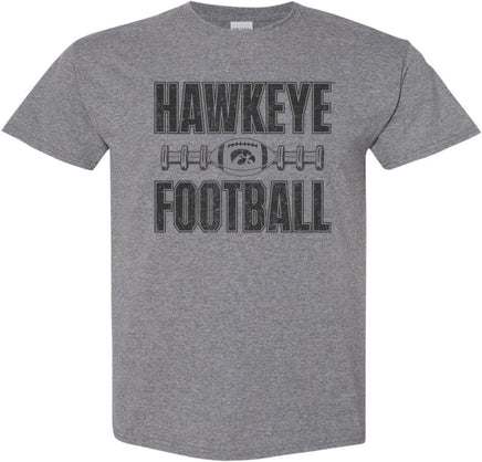 Cheer on the Iowa Hawkeyes at Kinnick Stadium wearing this Hawkeye Football shirt. This design has Hawkeye Football, a football with the Tigerhawk, and football laces. Printed on a pre-shrunk, 50/50 cotton/poly medium gray t-shirt with black ink. All of our Iowa Hawkeye designs are Officially Licensed and approved by the University of Iowa.