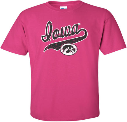 A bright pink short-sleeve t-shirt featuring a distressed black and white design on the front that reads 'Iowa' above the Iowa Hawkeyes Tigerhawk logo.