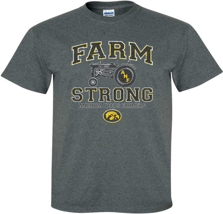 A dark gray short-sleeve t-shirt with a distressed black, white and gold design on the front that reads 'FARM STRONG' and 'AMERICA NEEDS FARMERS' with an old tractor and the Iowa Hawkeyes Tigerhawk logo.