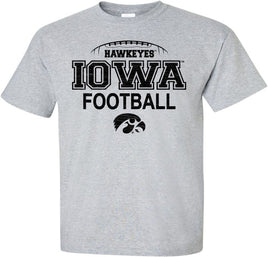 This Iowa Football design features the laces of a football above Hawkeyes-Iowa Football with the Tigerhawk. Printed on a pre-shrunk, 90/10 cotton/poly light gray t-shirt with black ink. All of our Iowa Hawkeye designs are Officially Licensed and approved by the University of Iowa.